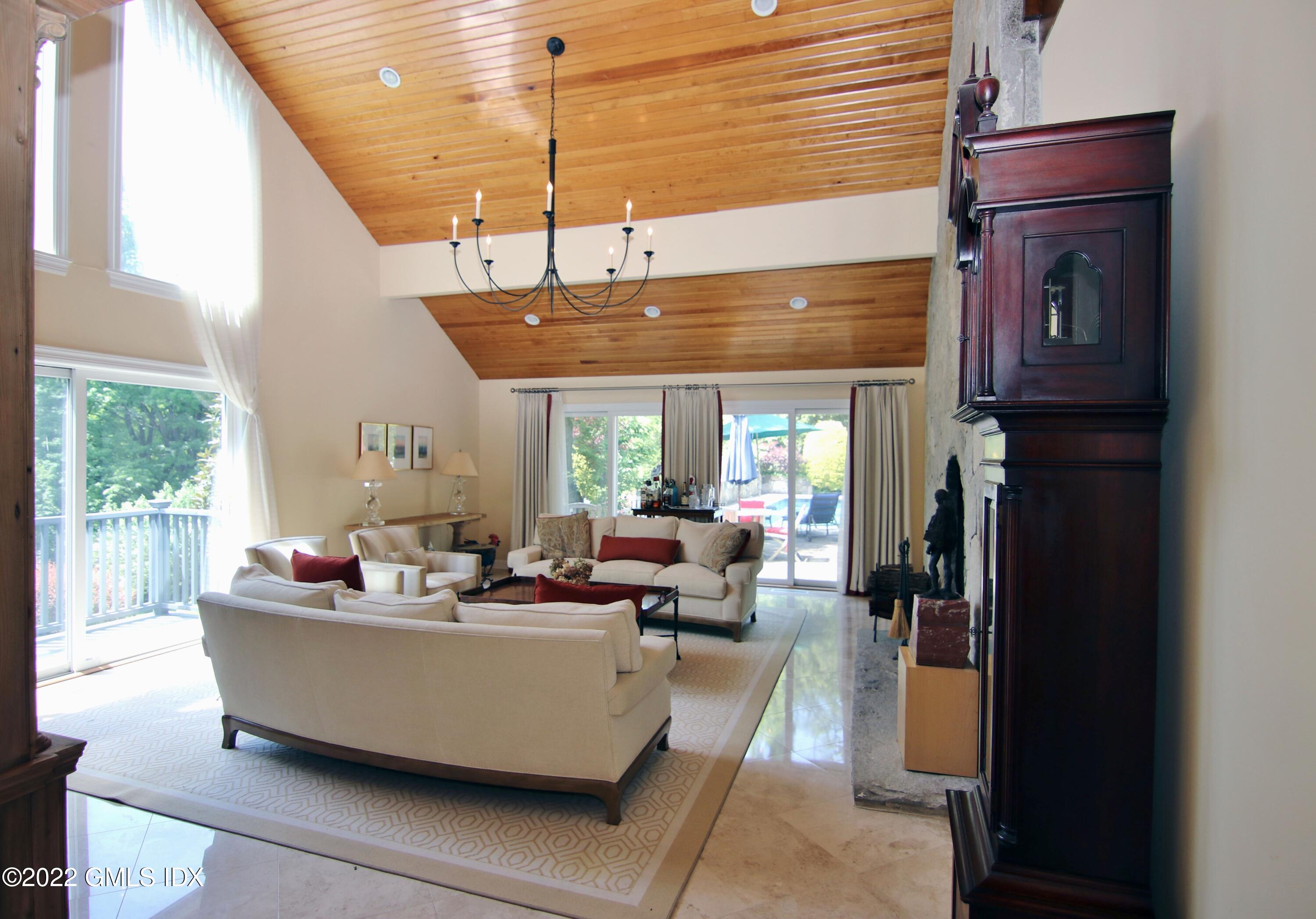929 Riverbank Road Stamford, CT 06903 - Photo 7 of 42 Dramatic LR has 15-ft ceiling