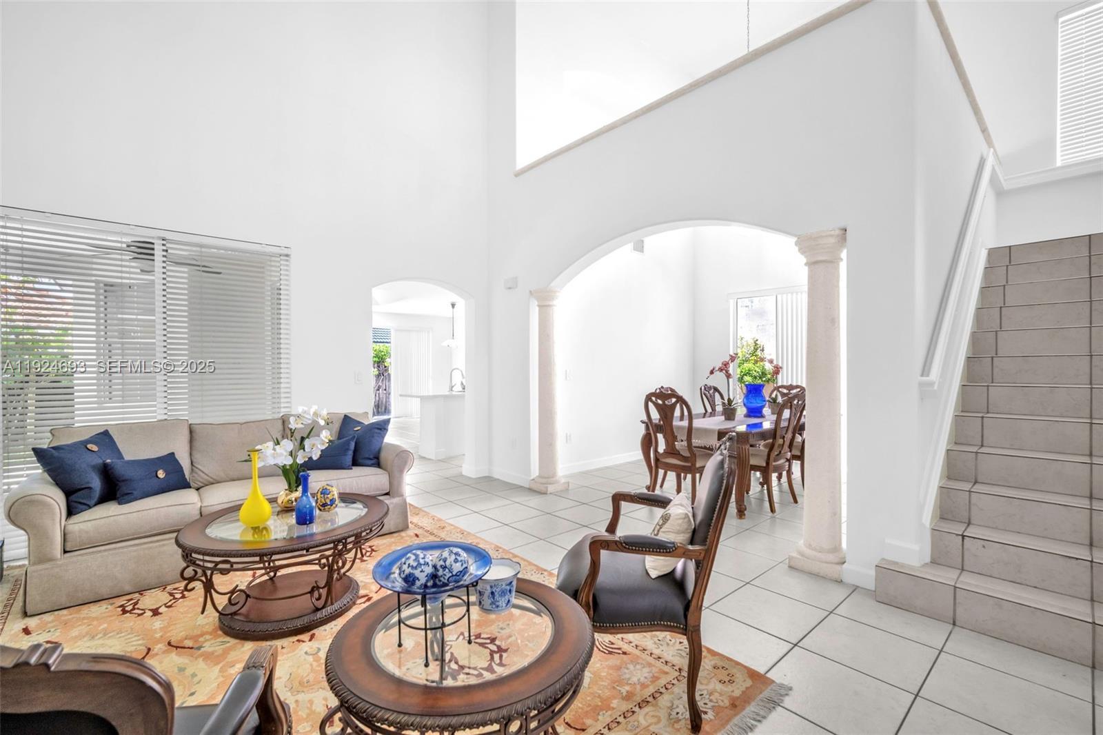 13030 Northwest 8th Street Miami, FL 33182 - Photo 15 of 54 a living room with furniture and a wooden floor