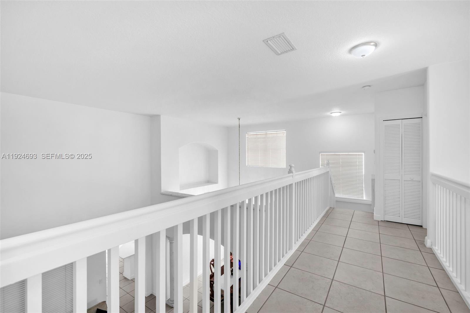 13030 Northwest 8th Street Miami, FL 33182 - Photo 35 of 54 a view of a hallway with closet