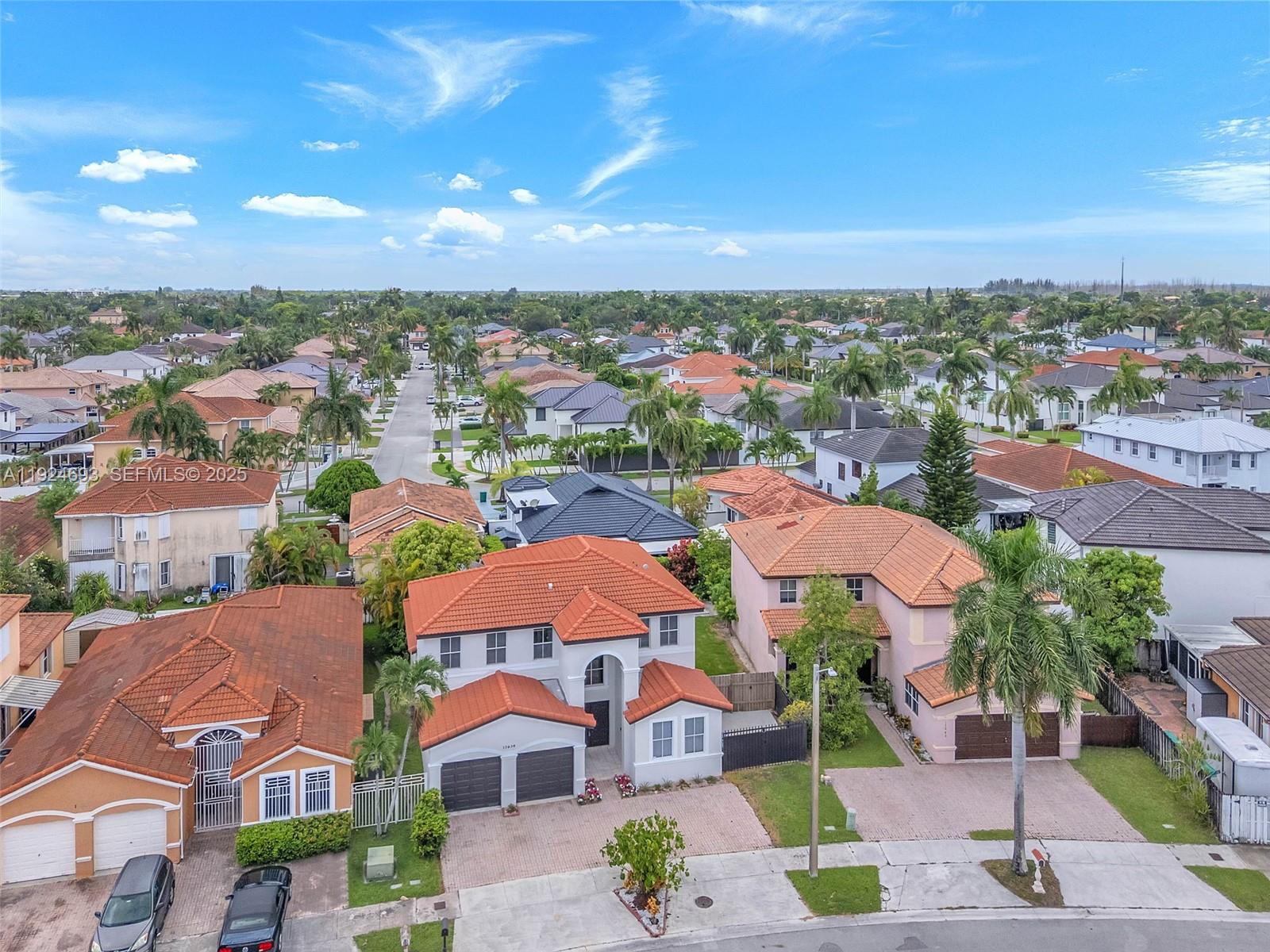 13030 Northwest 8th Street Miami, FL 33182 - Photo 43 of 54 an aerial view of residential houses with outdoor space and street view