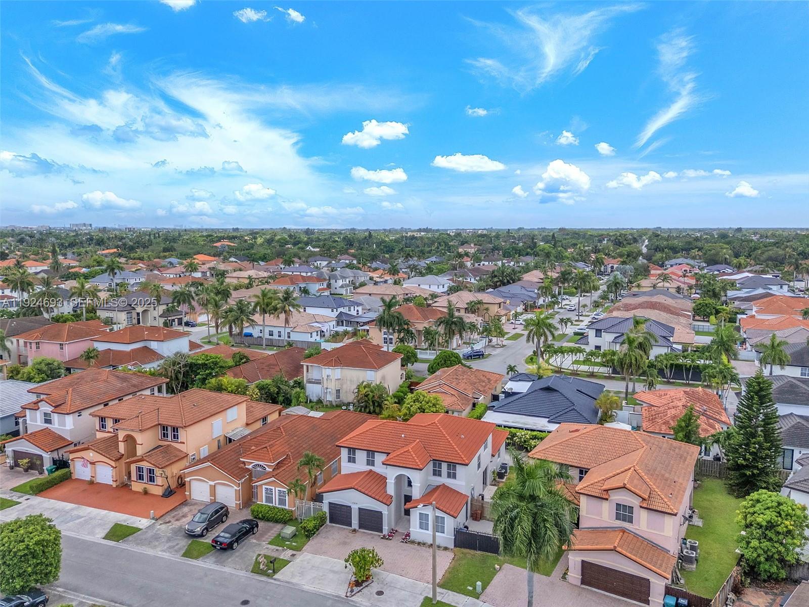 13030 Northwest 8th Street Miami, FL 33182 - Photo 45 of 54 an aerial view of residential houses with outdoor space