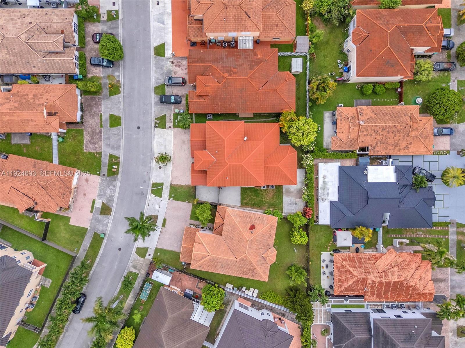 13030 Northwest 8th Street Miami, FL 33182 - Photo 48 of 54 an aerial view of multiple houses with yard