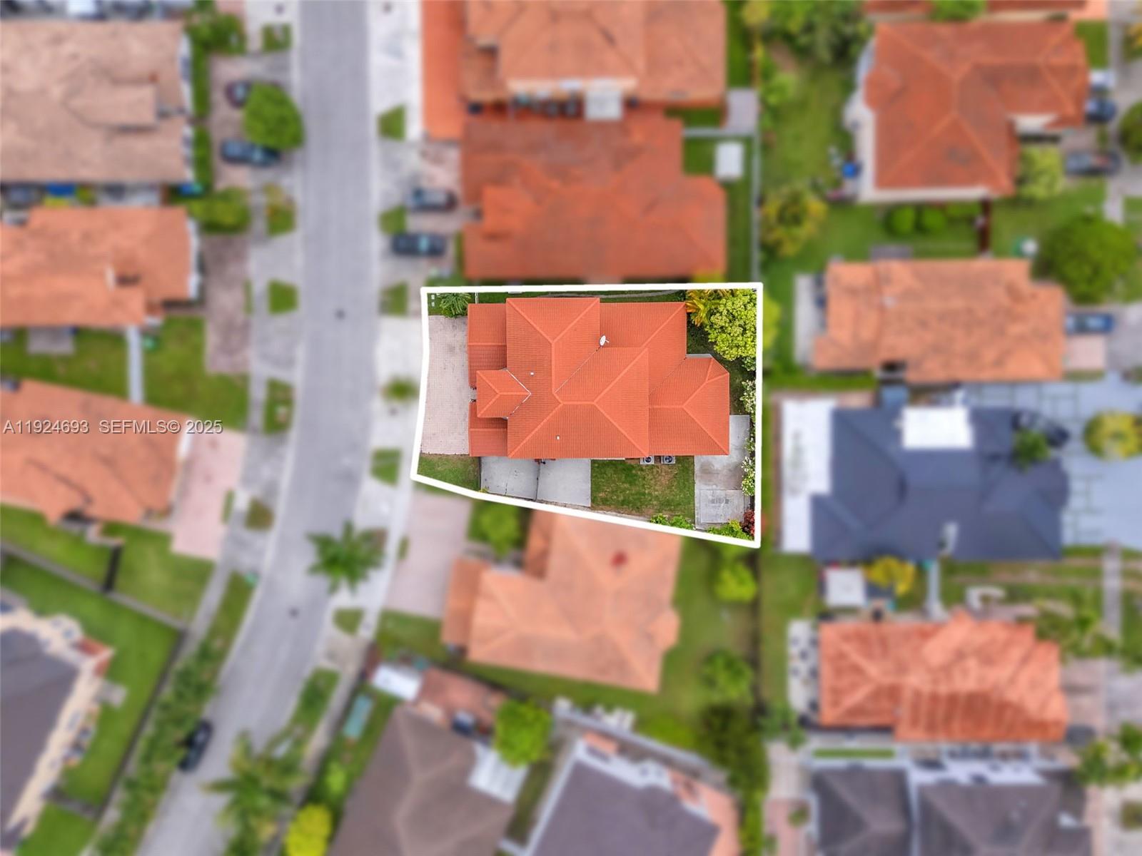 13030 Northwest 8th Street Miami, FL 33182 - Photo 49 of 54 an aerial view of multiple houses with yard