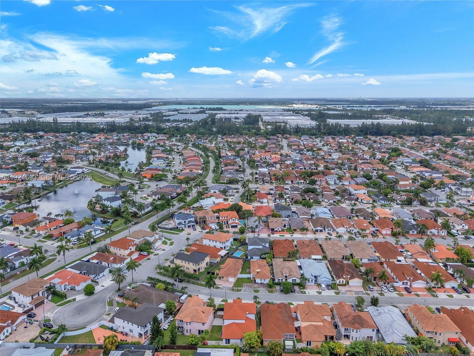 13030 Northwest 8th Street Miami, FL 33182 - Photo 52 of 54 an aerial view of residential building with outdoor space