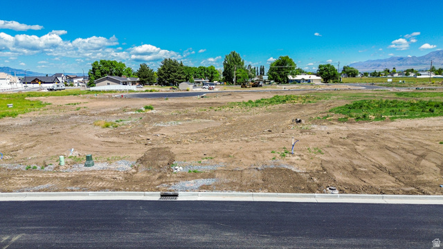 1171 West 3275th South, Unit 2 Logan, UT 84321 - Photo 3 of 21 Expansive undeveloped lot with partial grading
