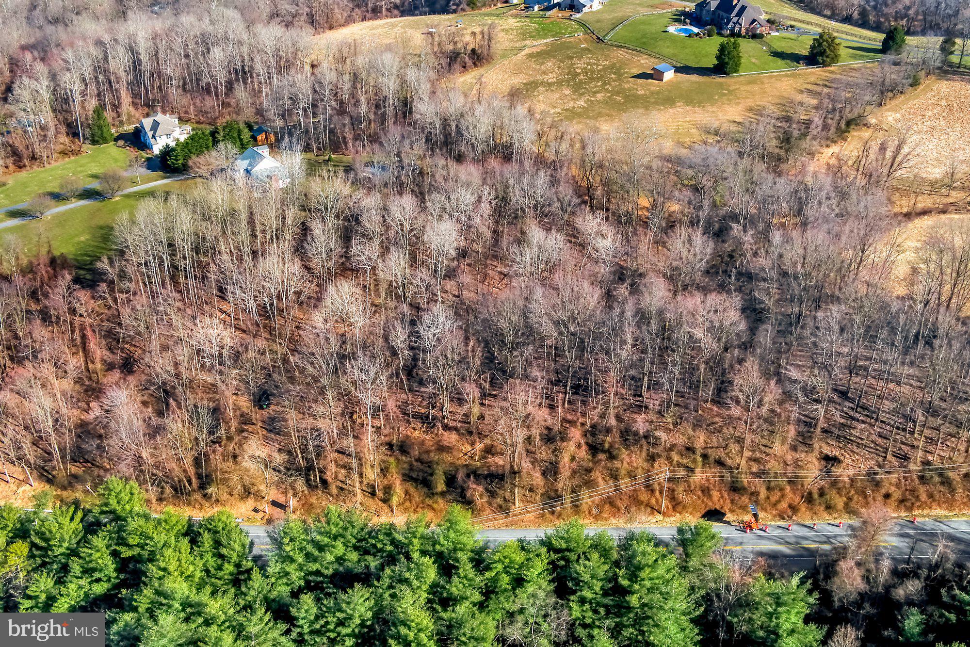 Six acre wooded building lot, driveway