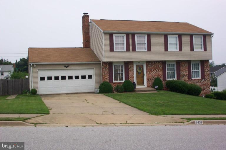 6431 St Phillips Road Linthicum Heights, MD 21090 - Photo 1 of 24 front view of a house with a yard