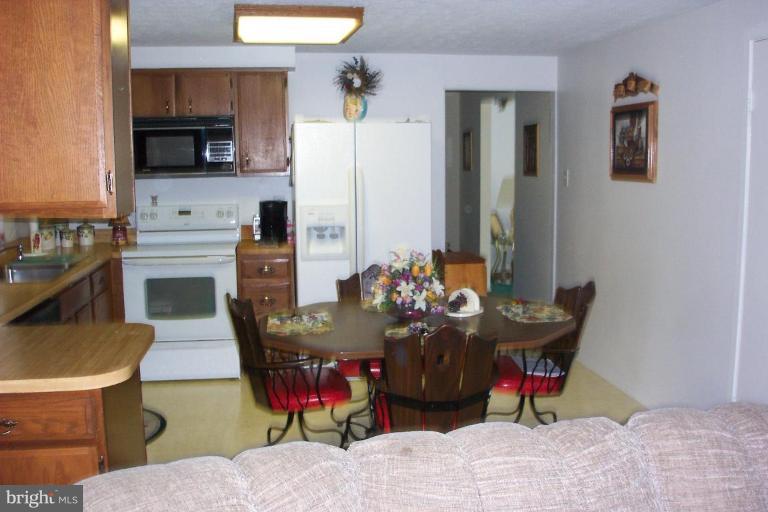 6431 St Phillips Road Linthicum Heights, MD 21090 - Photo 7 of 24 a view of a dining room with furniture