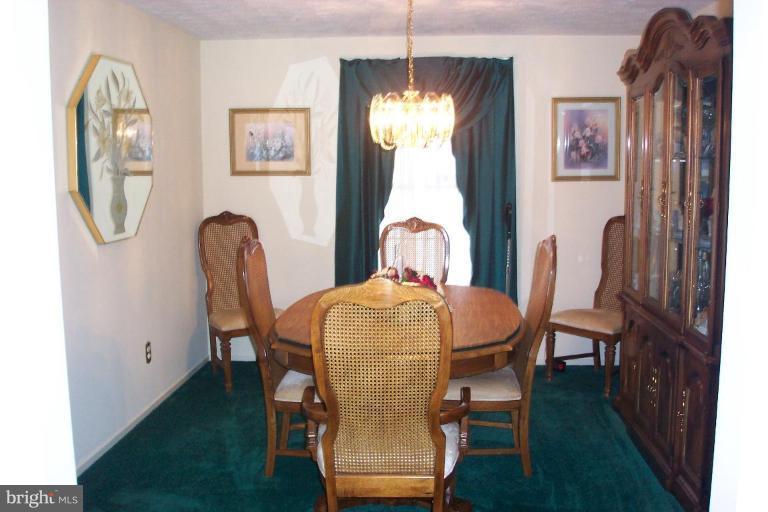 6431 St Phillips Road Linthicum Heights, MD 21090 - Photo 10 of 24 a dining room with furniture and window
