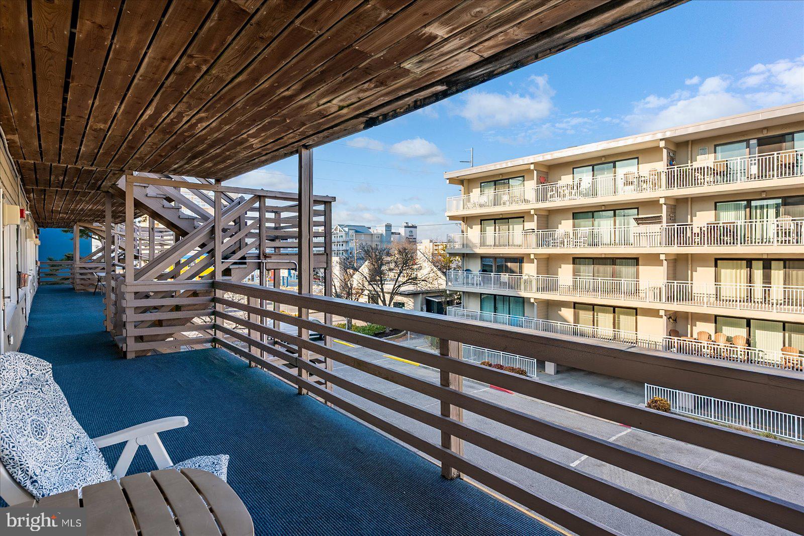 9 46th Street, Unit 22 Ocean City, MD 21842 - Photo 31 of 43 a view of a balcony with chairs