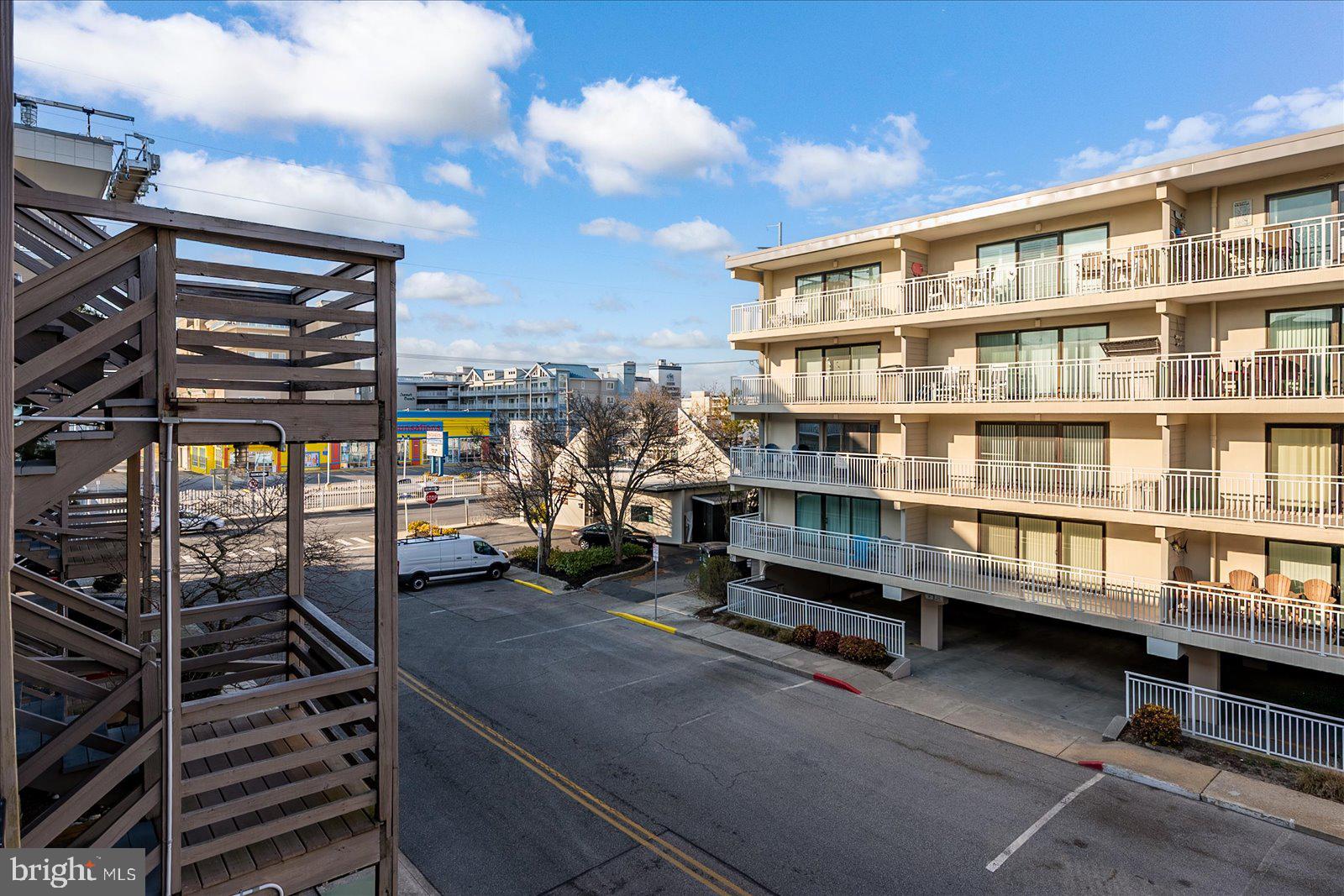 9 46th Street, Unit 22 Ocean City, MD 21842 - Photo 34 of 43 a front view of a building with glass windows