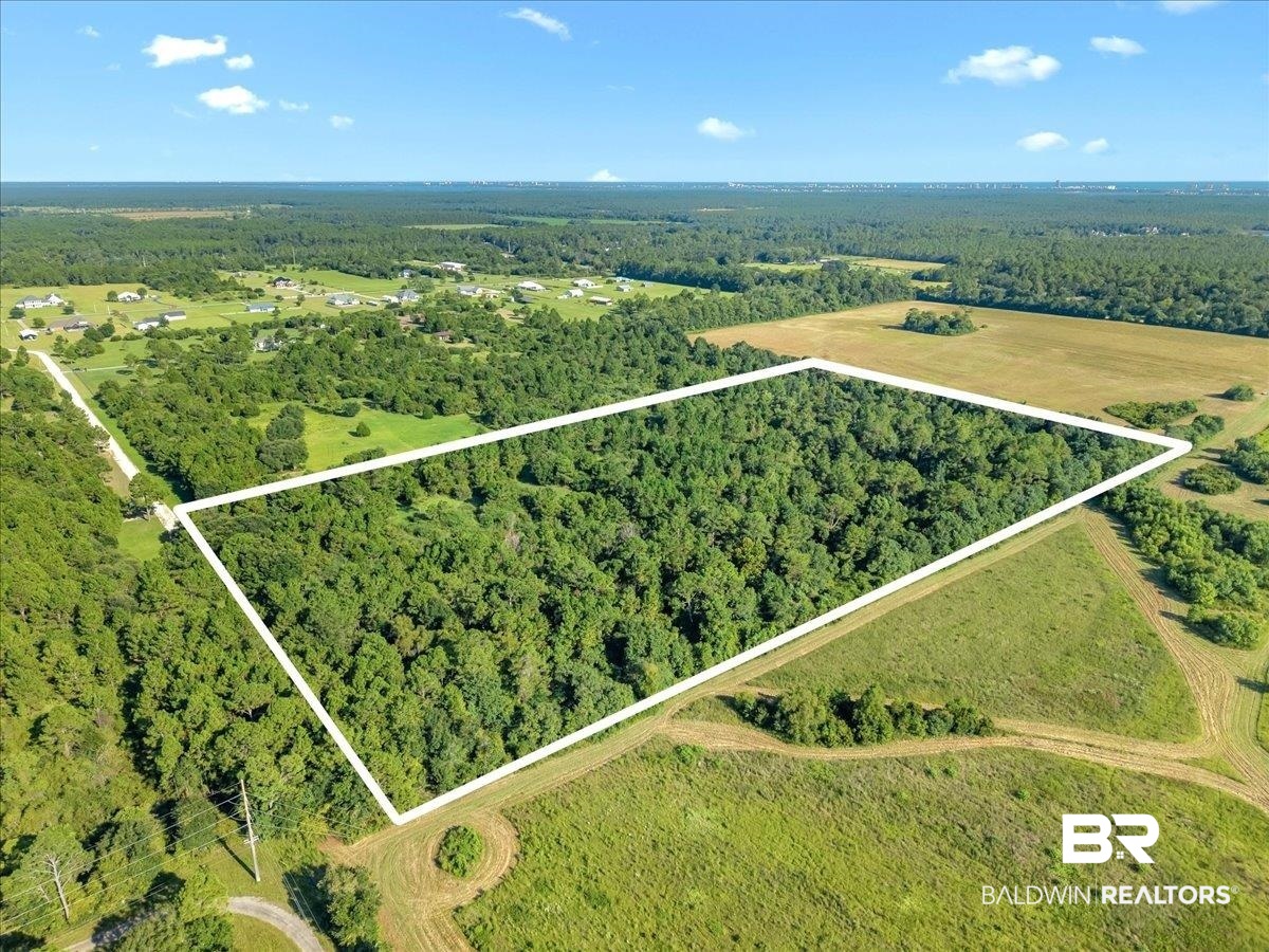0 Stucki Road Elberta, AL 36530 - Photo 3 of 15 Aerial overview of property's location featuring a heavily wooded area and property parcel outlined