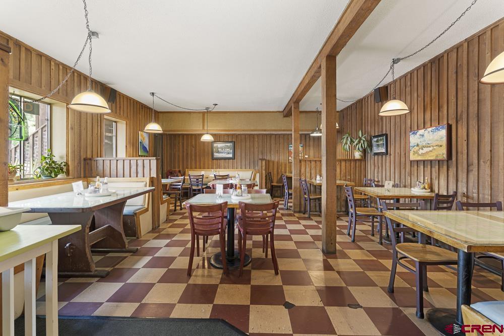 595 East 7th Avenue Durango, CO 81301 - Photo 4 of 34 a large dining hall with stainless steel appliances a sink and a stove