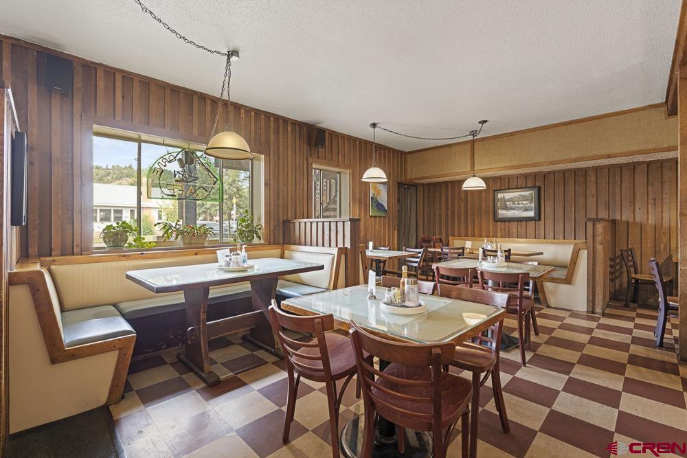 595 East 7th Avenue Durango, CO 81301 - Photo 5 of 34 a dining room with a table and chairs