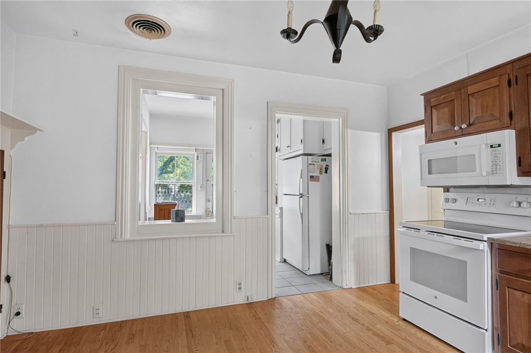 765 East Macada Road Bethlehem, PA 18017 - Photo 18 of 46 A classic kitchen with hardwood floors features an adjacent pantry space and ample natural light.