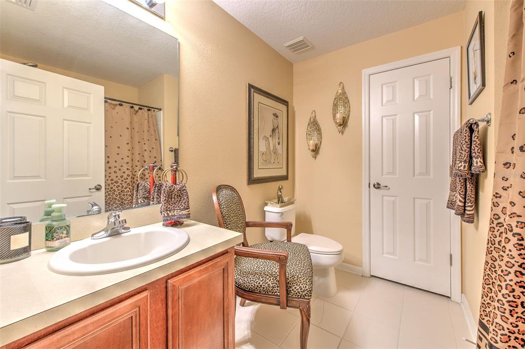 7352 Bridgeview Drive Zephyrhills, FL 33545 - Photo 28 of 49 a bathroom with a sink double vanity and a mirror