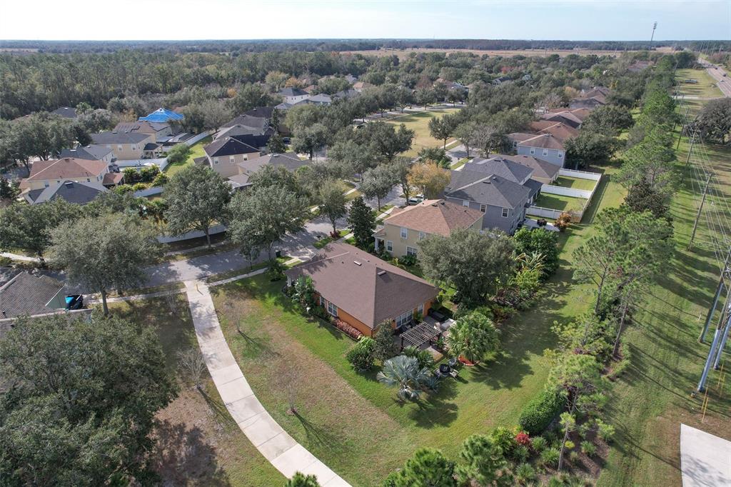 7352 Bridgeview Drive Zephyrhills, FL 33545 - Photo 46 of 49 an aerial view of a house with a yard