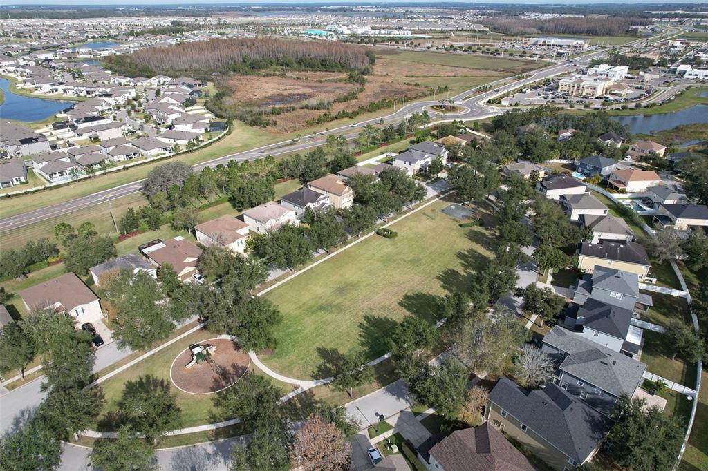 7352 Bridgeview Drive Zephyrhills, FL 33545 - Photo 48 of 49 an aerial view of residential houses with outdoor space