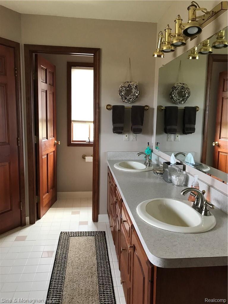 6768 Rattle Run Road St. Clair, MI 48079 - Photo 37 of 61 double sinks bath.jpg