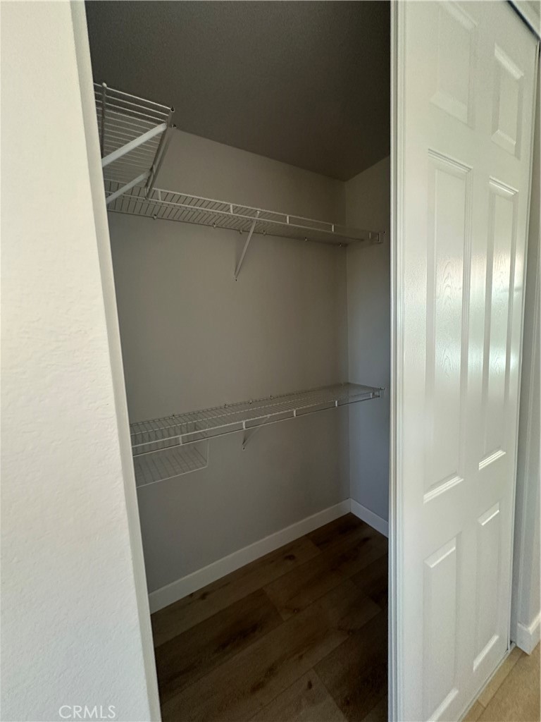 29652 Chandler Road Highland, CA 92346 - Photo 16 of 22 a view of walk in closet