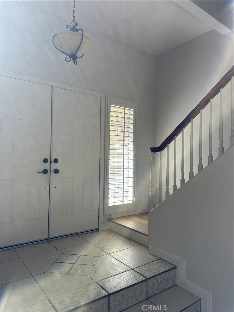 29652 Chandler Road Highland, CA 92346 - Photo 2 of 22 a view of an empty room with a window