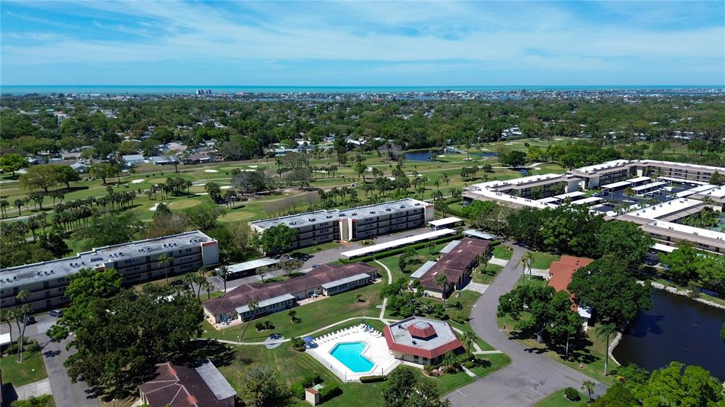 12200 Vonn Road, Unit 2206 Largo, FL 33774 - Photo 53 of 60 an aerial view of residential houses with outdoor space