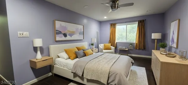 a bedroom with a bed and a large mirror