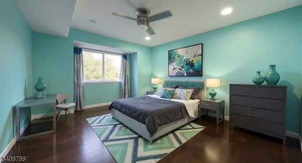 a bedroom with a bed and a table