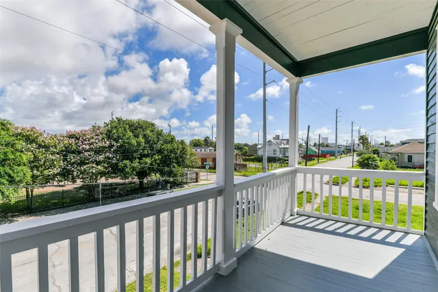 a view of entryway with wooden floor and stairs