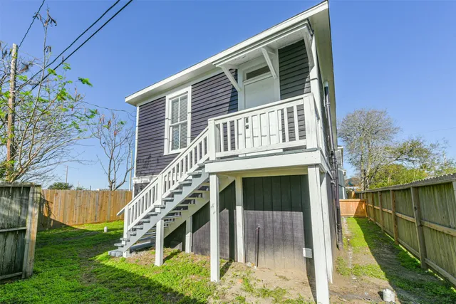a kitchen with stainless steel appliances granite countertop a stove a microwave and a refrigerator