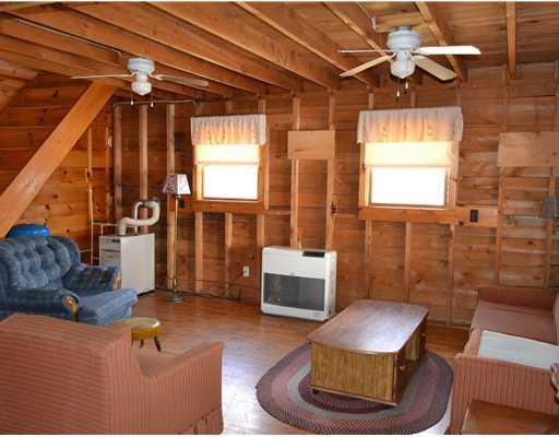 16 Albert Point Stetson, ME 04488 - Photo 7 of 13 Living Room.