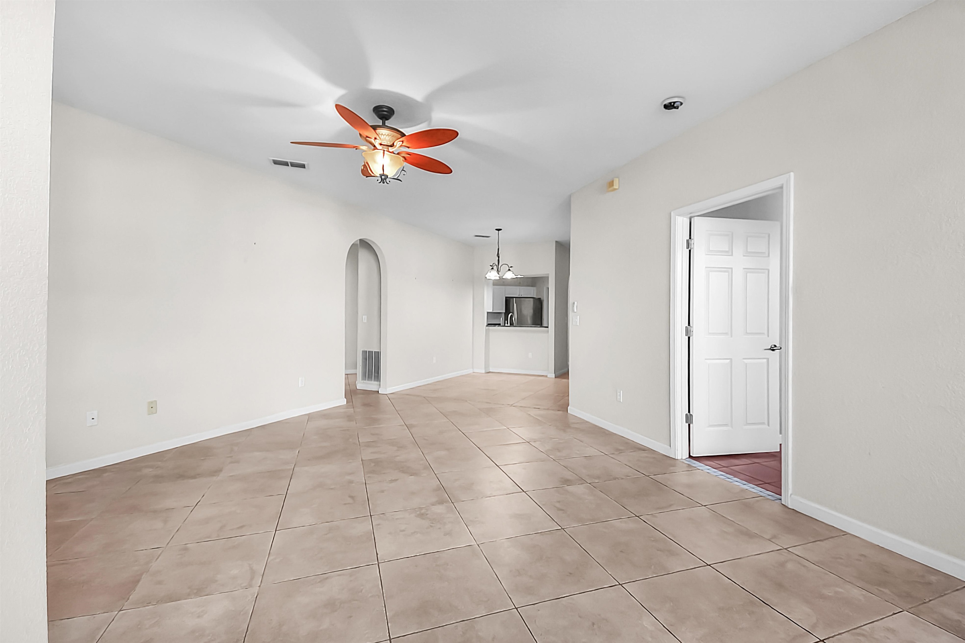 2221 Vista Cove Road St. Augustine, FL 32084 - Photo 12 of 30 a view of empty room with a ceiling fan and window