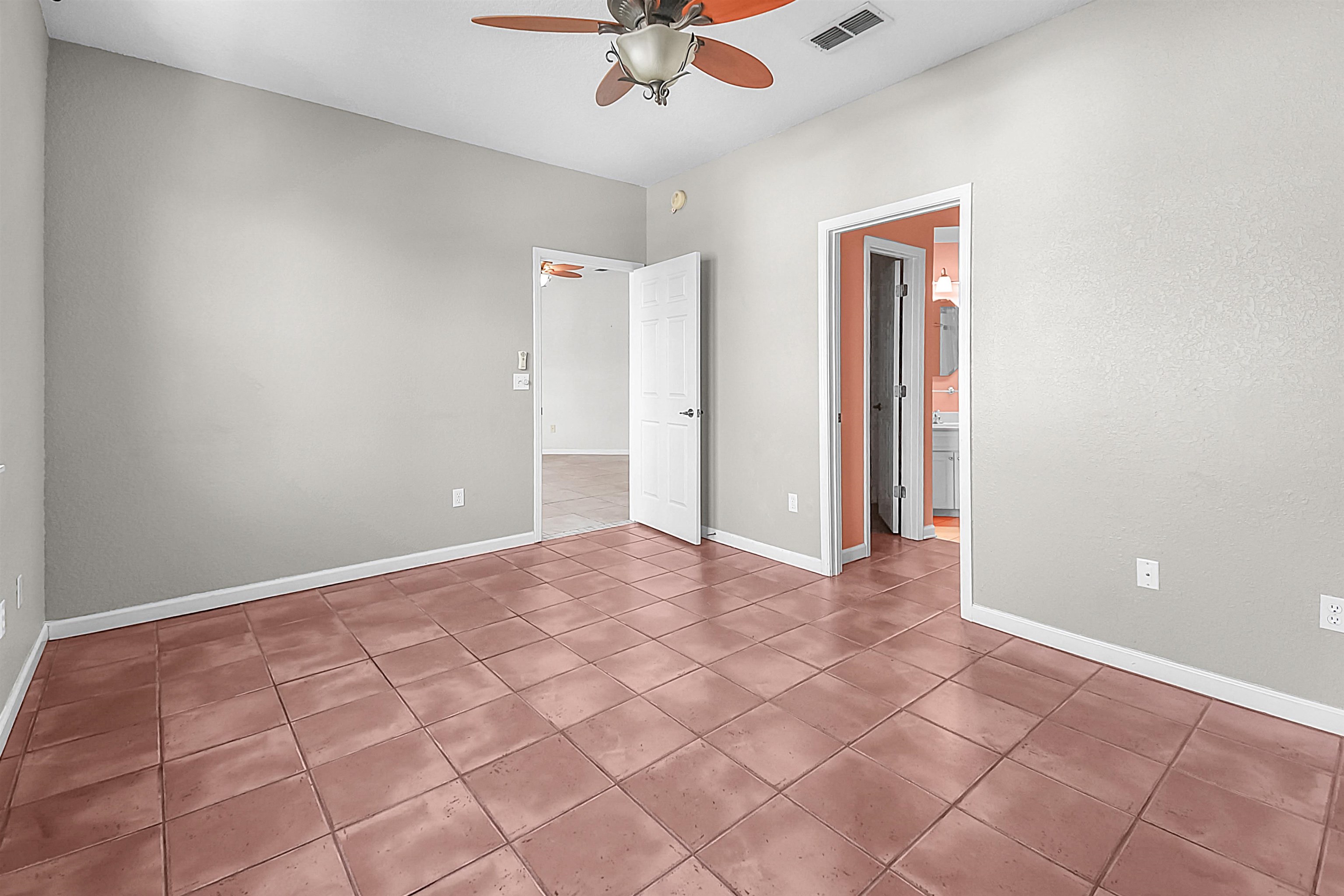 2221 Vista Cove Road St. Augustine, FL 32084 - Photo 15 of 30 a view of an empty room and a ceiling fan