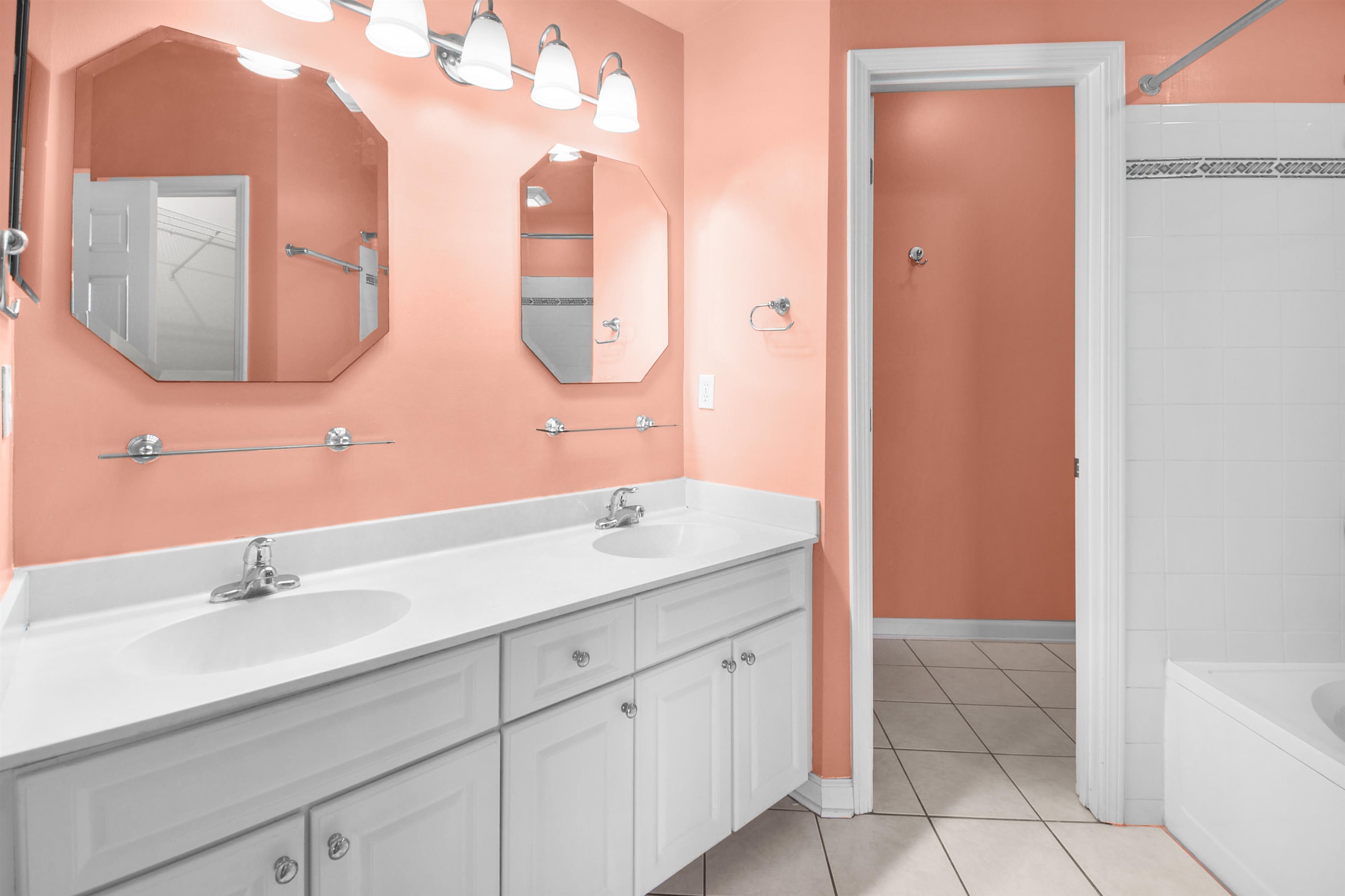 2221 Vista Cove Road St. Augustine, FL 32084 - Photo 16 of 30 a bathroom with a double vanity sink mirror and