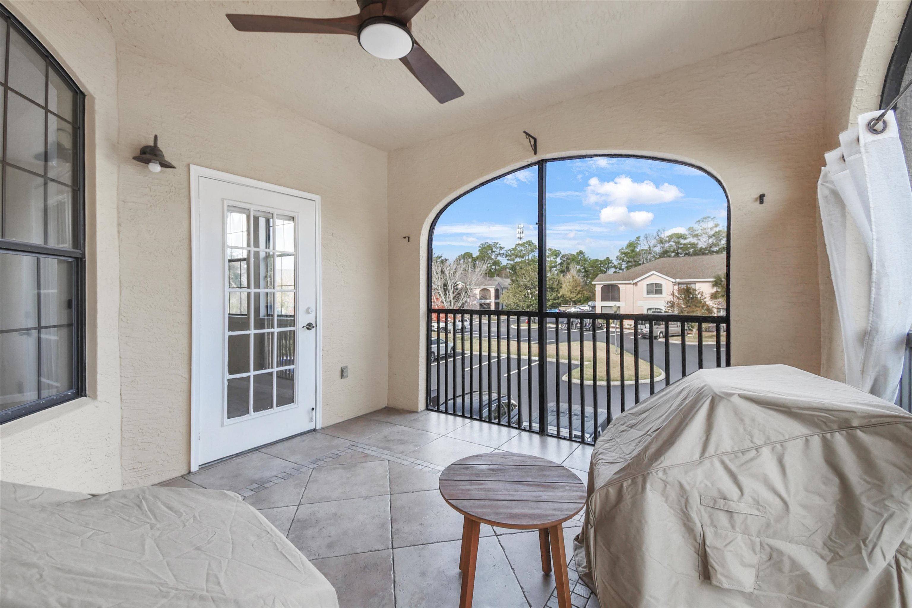 2221 Vista Cove Road St. Augustine, FL 32084 - Photo 25 of 30 a view of a bedroom with a bed and wooden floor