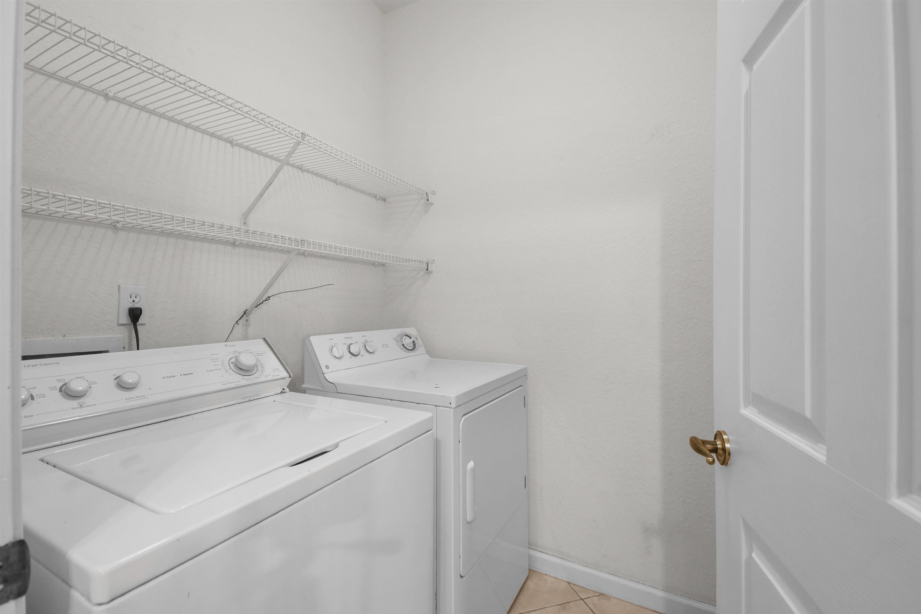 2221 Vista Cove Road St. Augustine, FL 32084 - Photo 8 of 30 a utility room with dryer and washer
