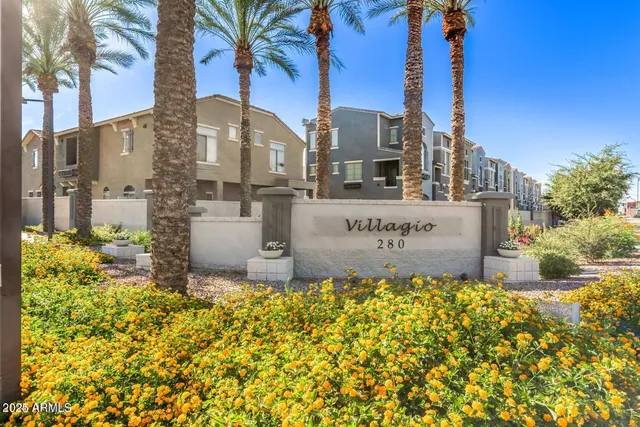 a view of a street with a building in the background