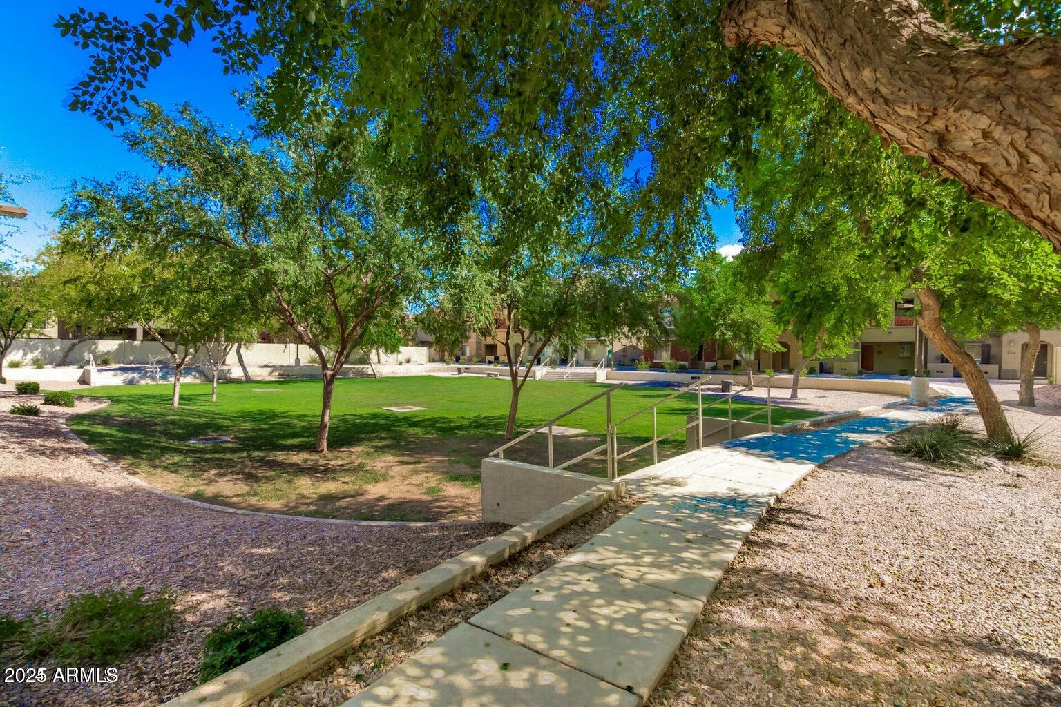 2402 East 5th Street, Unit 1402 Tempe, AZ 85288 - Photo 29 of 36 a view of a park with tree s