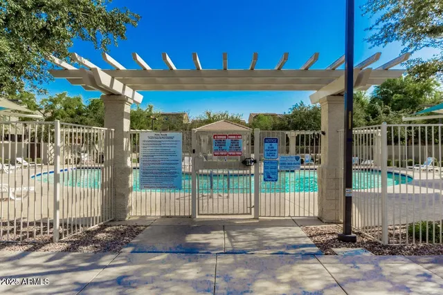 a view of a street with a building in the background