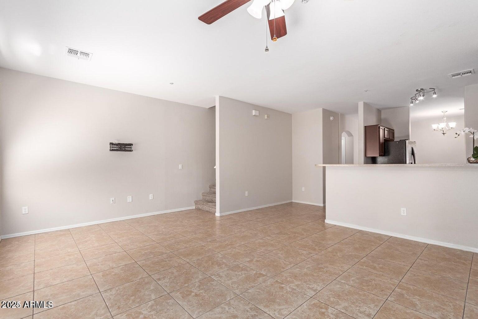 2402 East 5th Street, Unit 1402 Tempe, AZ 85288 - Photo 9 of 36 a view of a kitchen with a sink