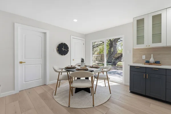 a kitchen with a sink cabinets and stainless steel appliances