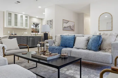 a view of a dining room with furniture window and outside view