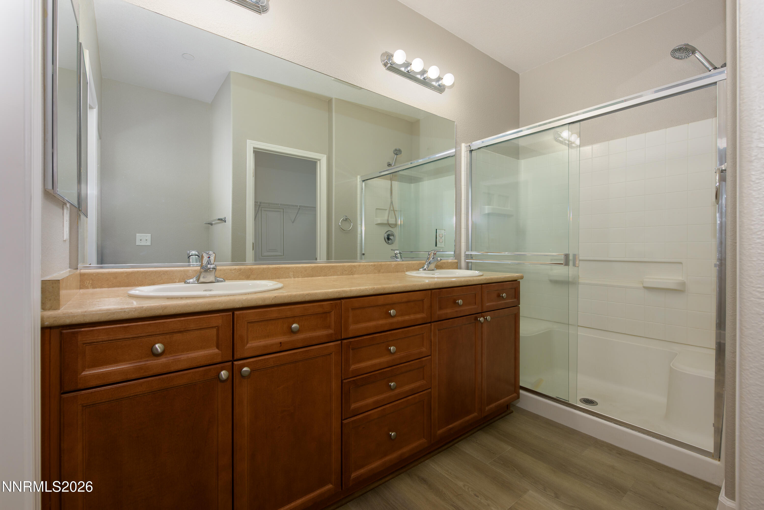 1221 Fonterra Way Carson City, NV 89701 - Photo 13 of 27 a bathroom with a granite countertop sink mirror and double