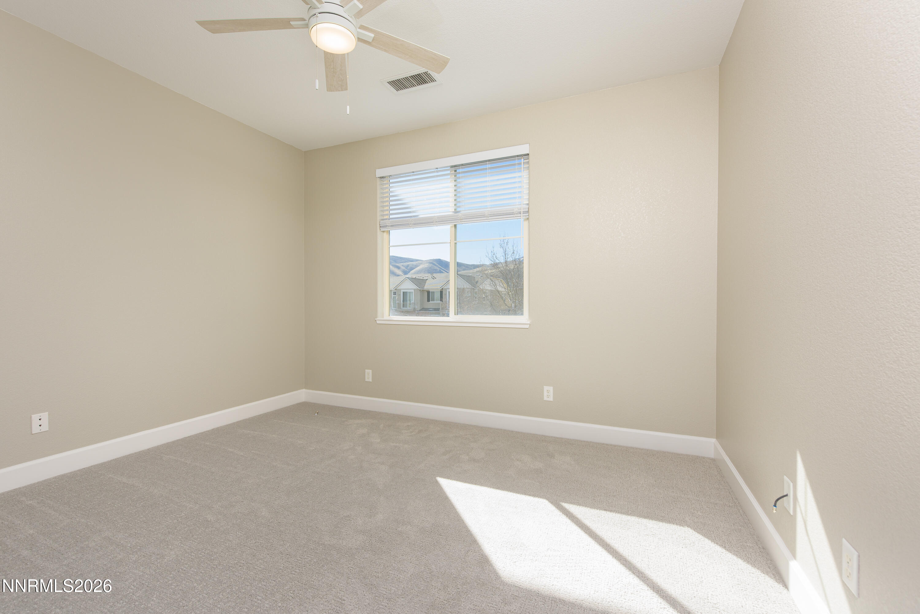 1221 Fonterra Way Carson City, NV 89701 - Photo 16 of 27 an empty room with a window