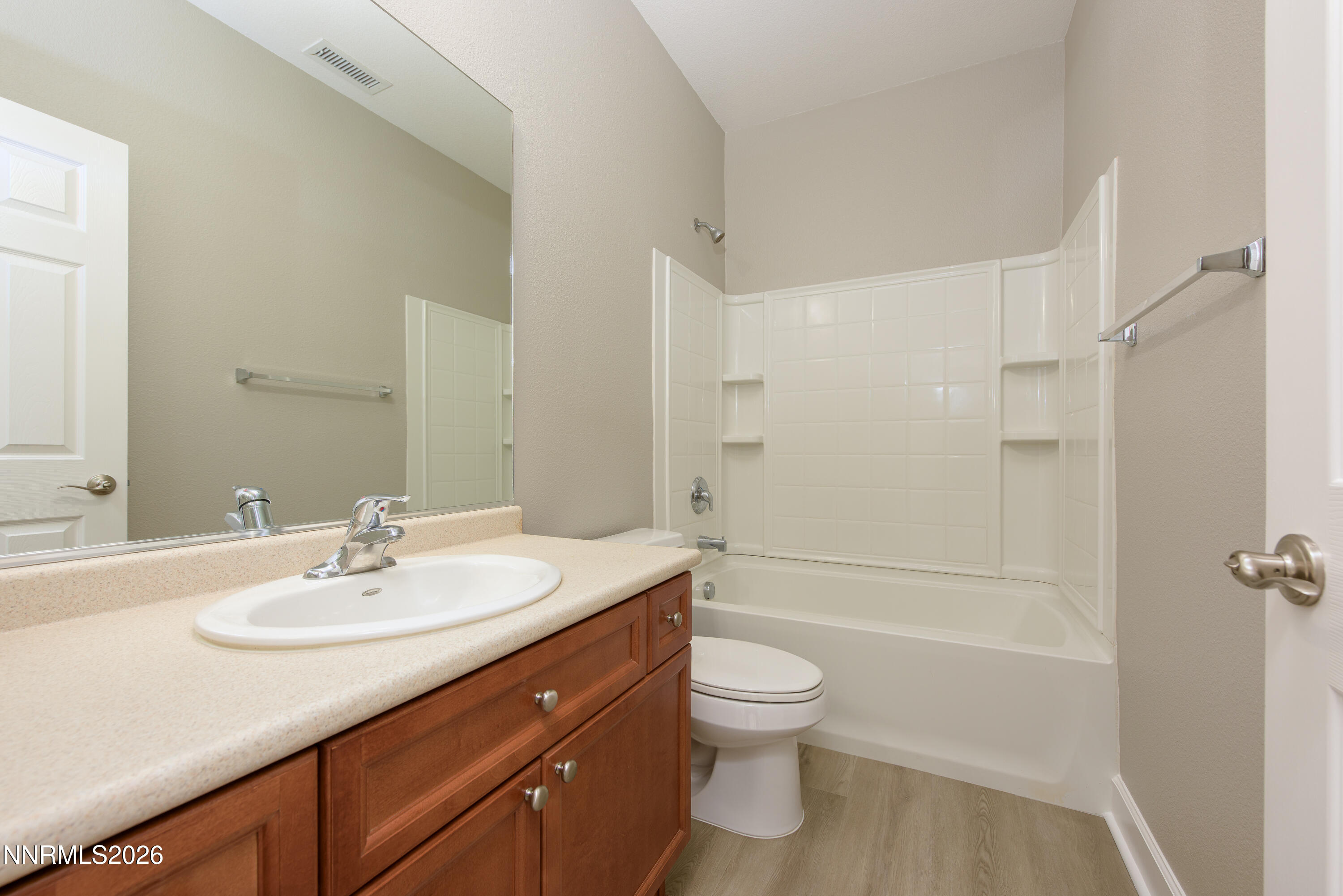 1221 Fonterra Way Carson City, NV 89701 - Photo 18 of 27 a bathroom with a sink a toilet and shower