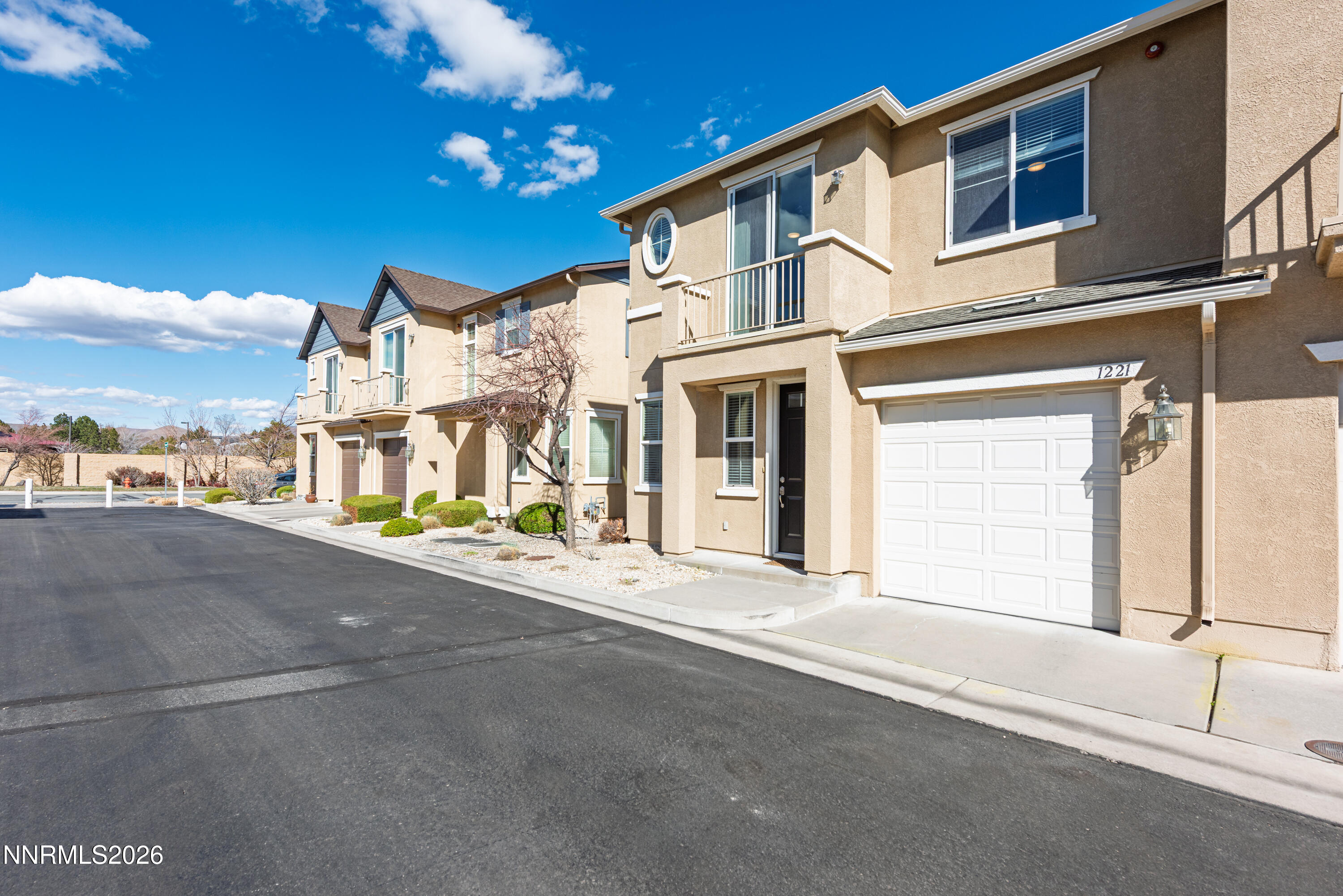 1221 Fonterra Way Carson City, NV 89701 - Photo 2 of 27 a view of a house with a street