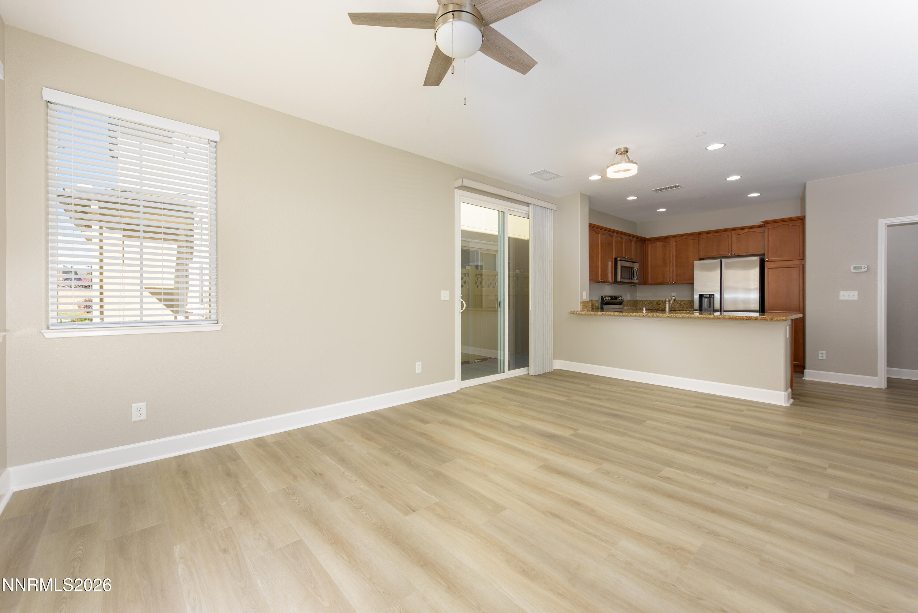 1221 Fonterra Way Carson City, NV 89701 - Photo 5 of 27 a view of a kitchen with a sink and a window