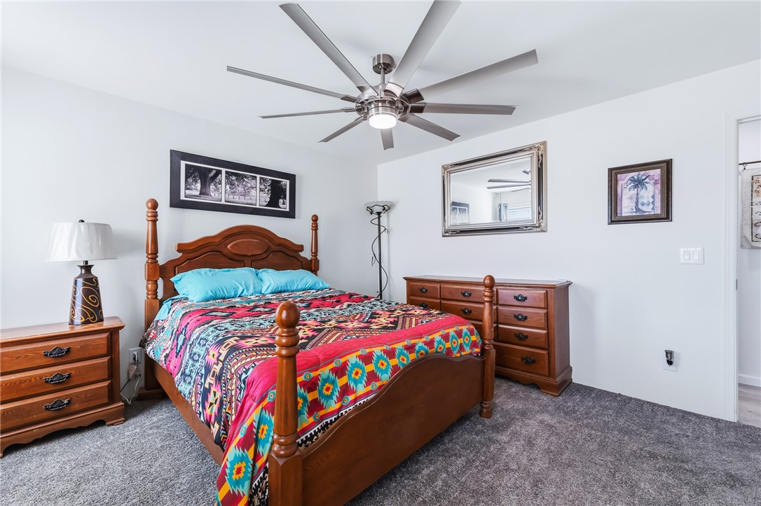 429 South Lochiel Road Golden Valley, AZ 86413 - Photo 29 of 61 Bedroom with carpet flooring and ceiling fan