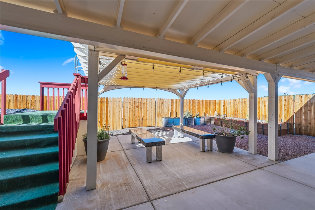 429 South Lochiel Road Golden Valley, AZ 86413 - Photo 37 of 61 Fenced backyard with a patio area