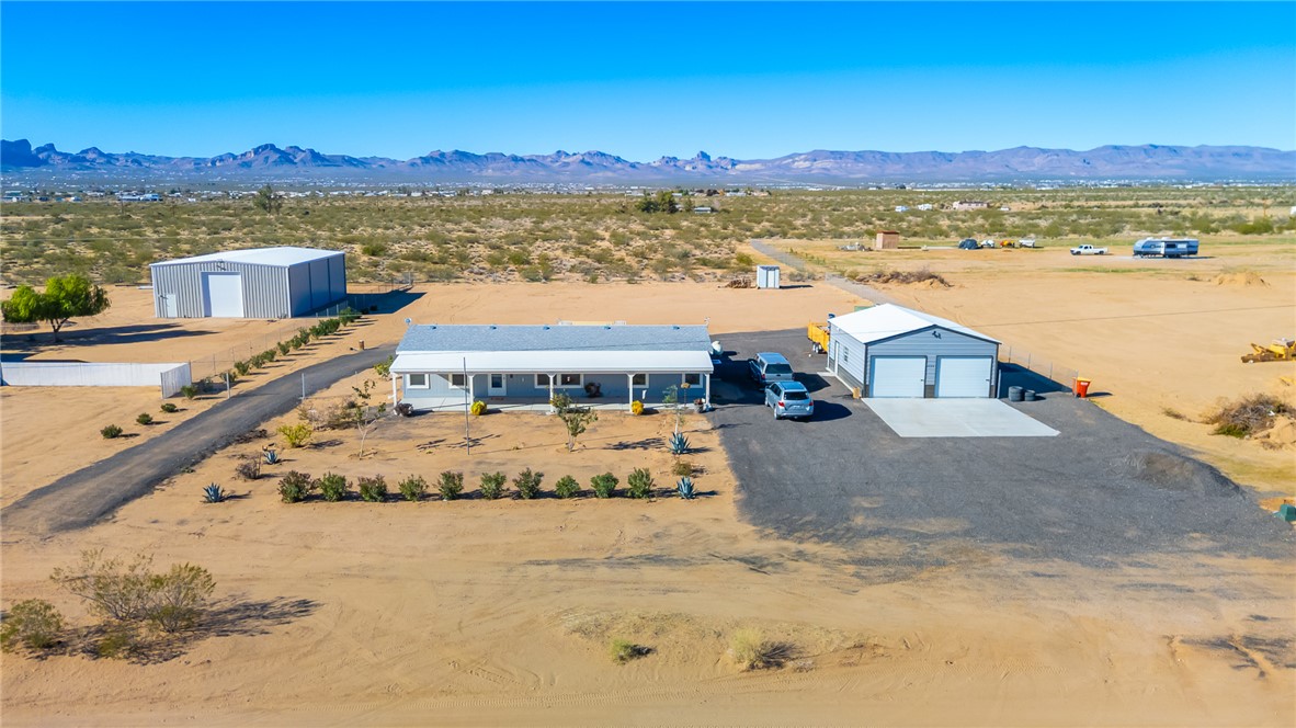429 South Lochiel Road Golden Valley, AZ 86413 - Photo 47 of 61 Aerial view of sparsely populated area with a desert landscape and a mountain backdrop